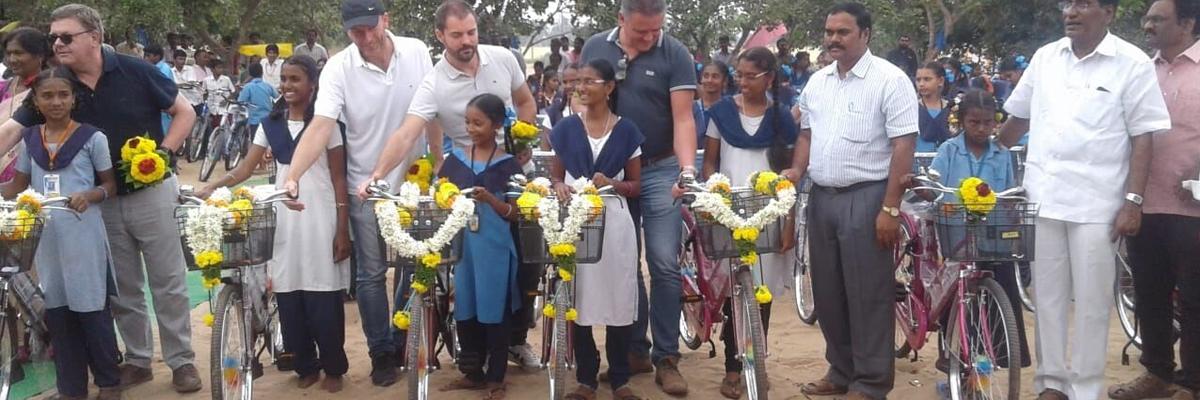 ASSIST, MORE donate 150 bicycles to school children