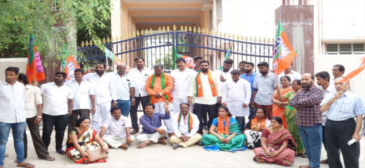 BJP stages dharna demanding opening of 100-bed hospital in Malkajgiri