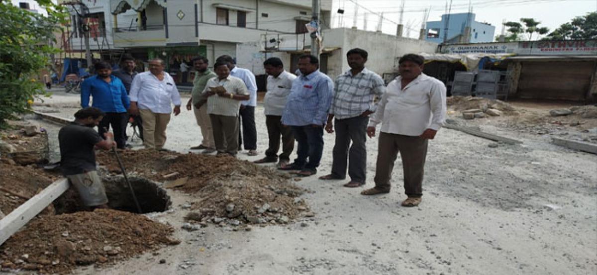 Corporator Dodla Venkatesh inspects CC road works