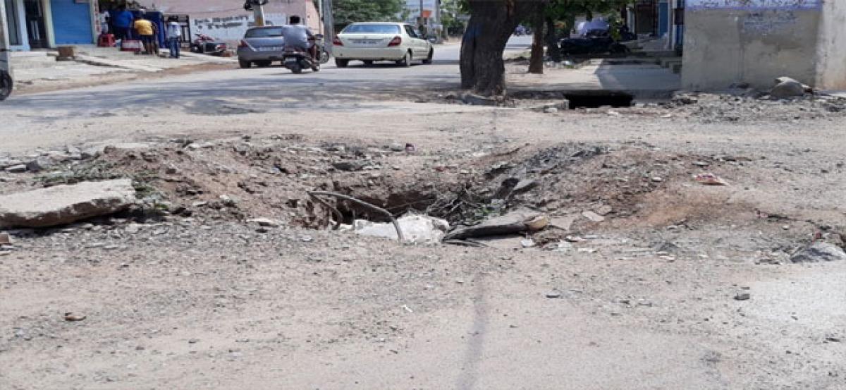 Dug-up road left open at Bharat Nagar