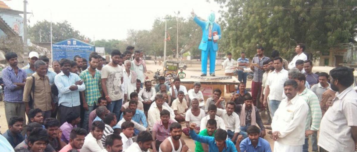 Protest over disrespect to Ambedkar statue