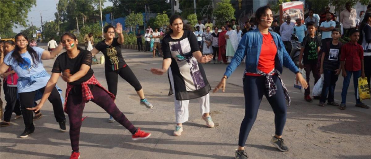 Students dance to songs at Anandalahari