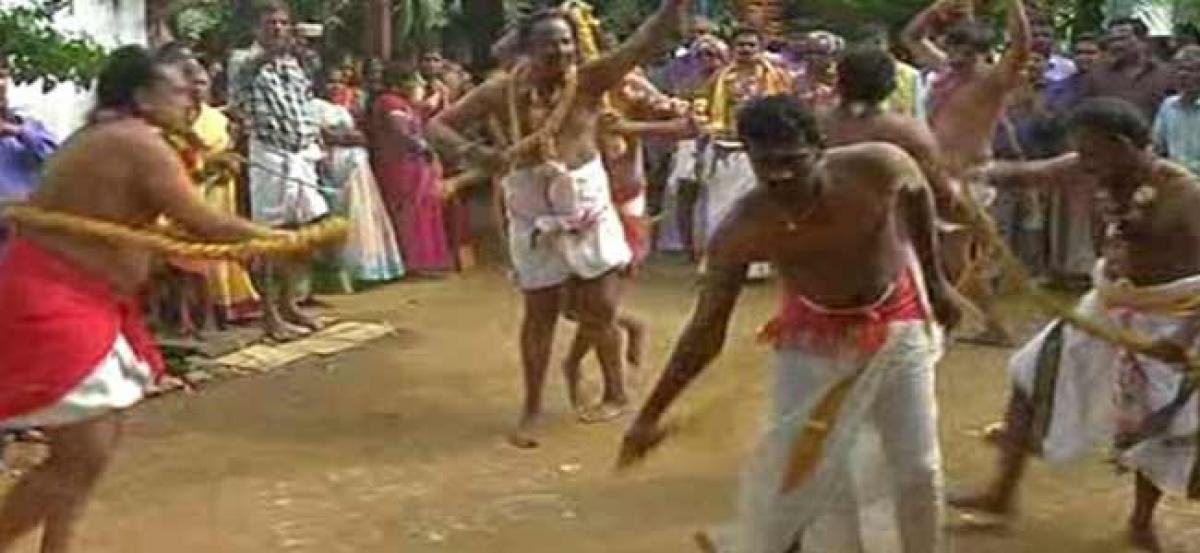 Devotees whip themselves in hope of TNs Poosaripalayam