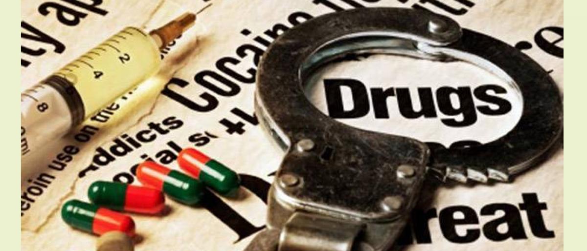 Drug Peddler Arrested