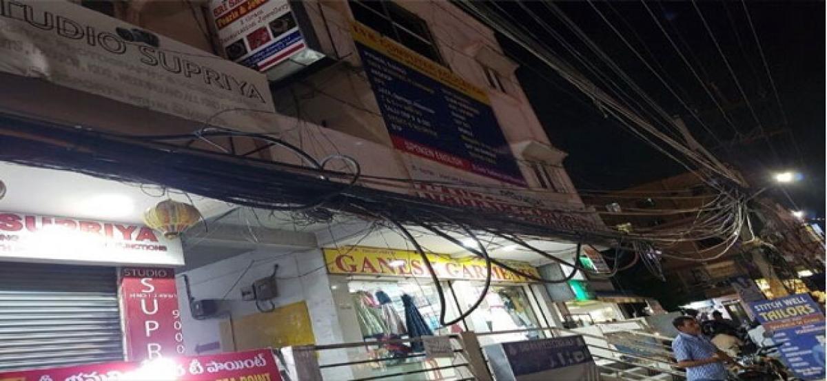 Low hanging wires in Nizampet a threat to people