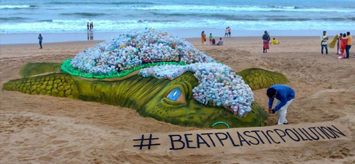 World Environment Day: Sand artists Olive Ridley turtle sculpture about plastic pollution drives point home