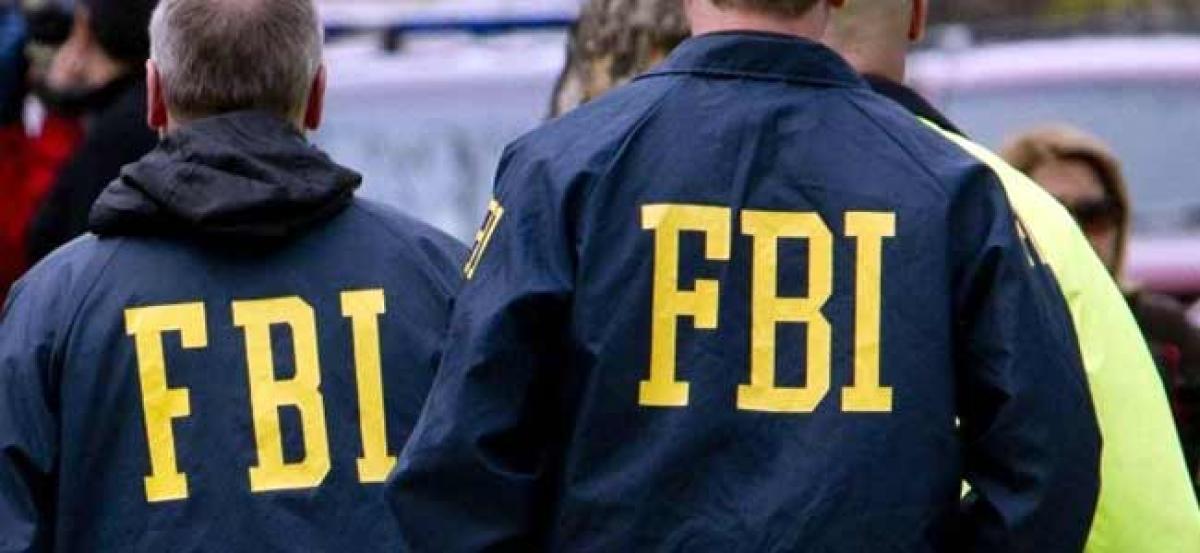FBI seeks motive after US airline worker stole plane and crashed it