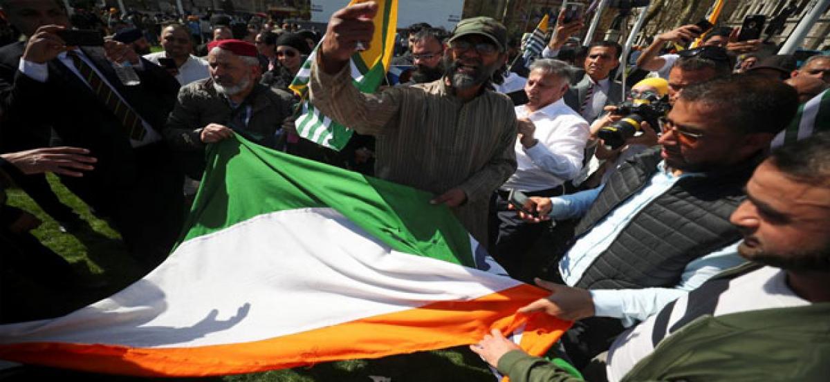 Indian flag torn as protests against PM Modi in London turn aggressive