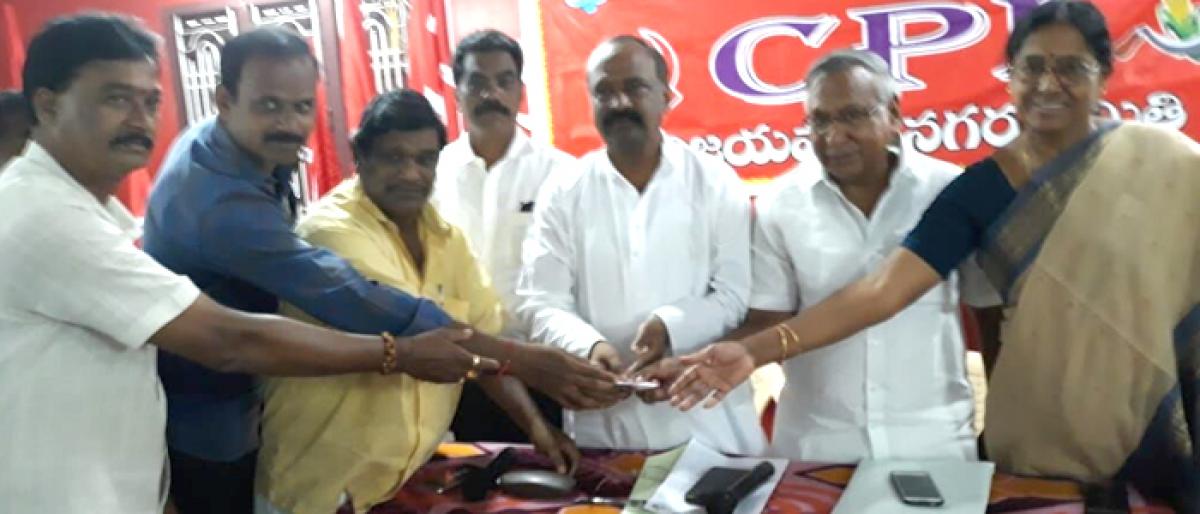 CPI collects donations for flood victims at Vijayawada