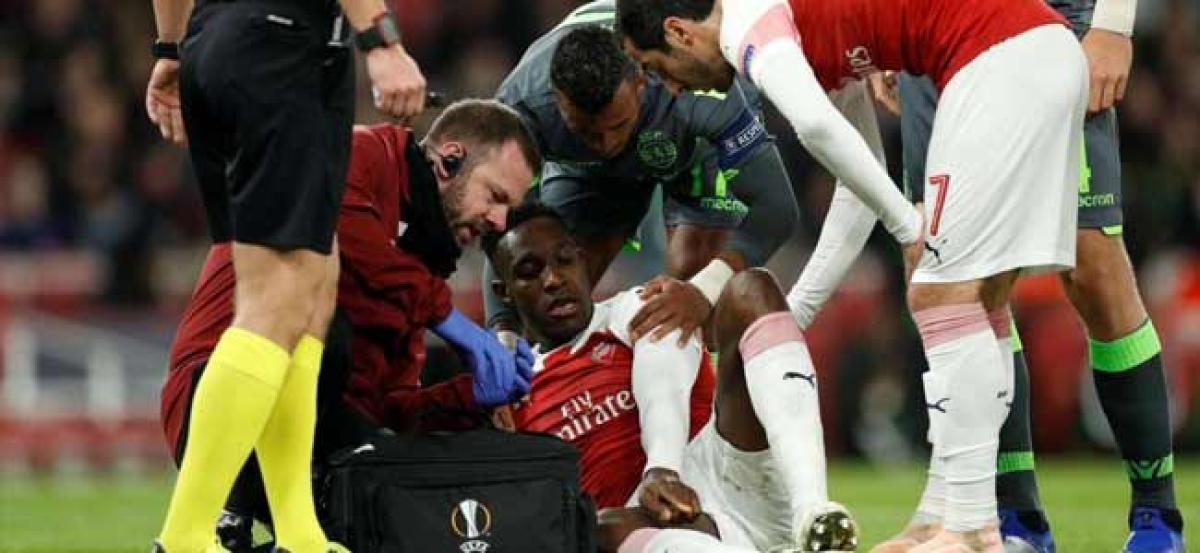 Europa League: Arsenal striker Danny Welbeck taken to hospital with serious injury