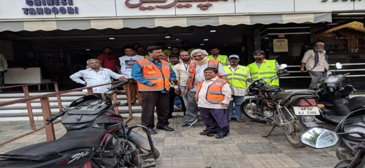 GHMC officials hold ‘silent protest’ in front of hotels