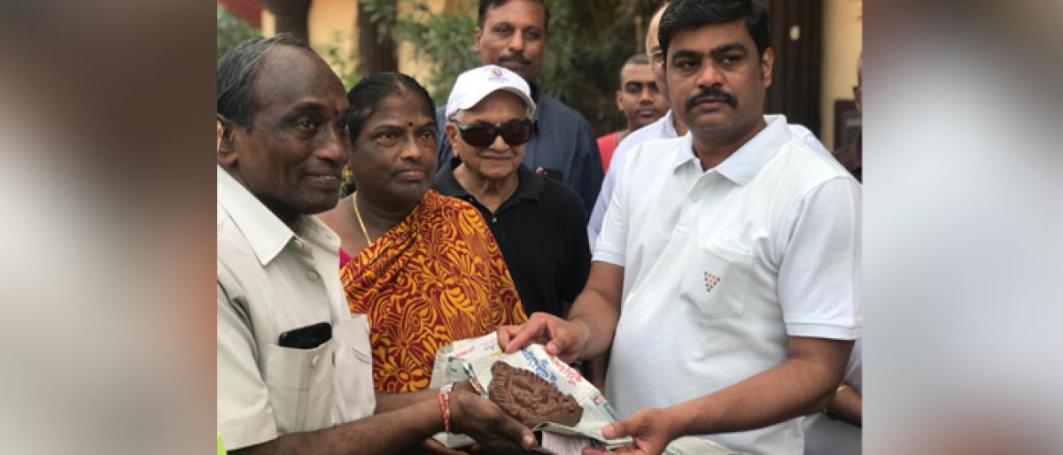 Civic chief J Nivas distributes clay Ganesh idols in Vijayawada