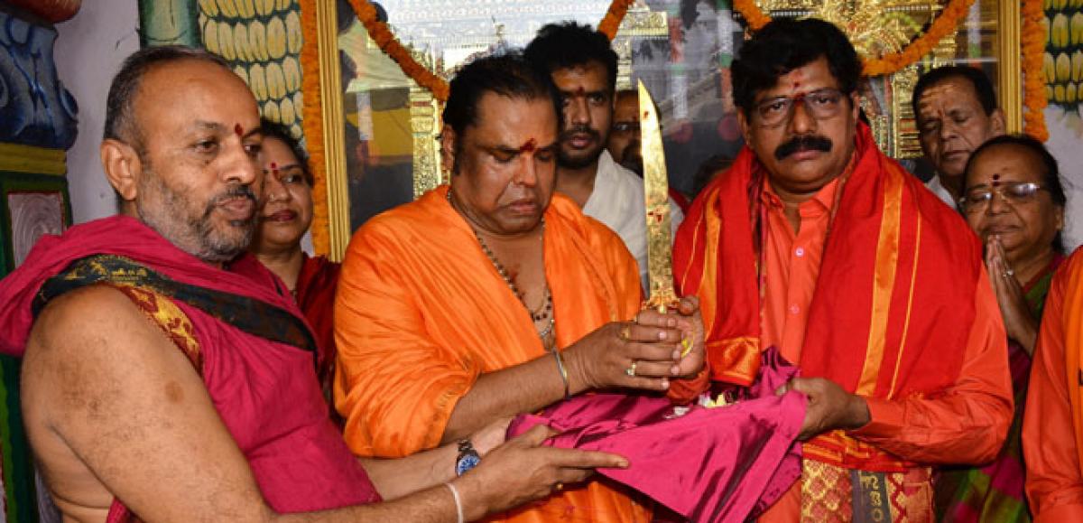 Golden sword presented to Srisailam temple