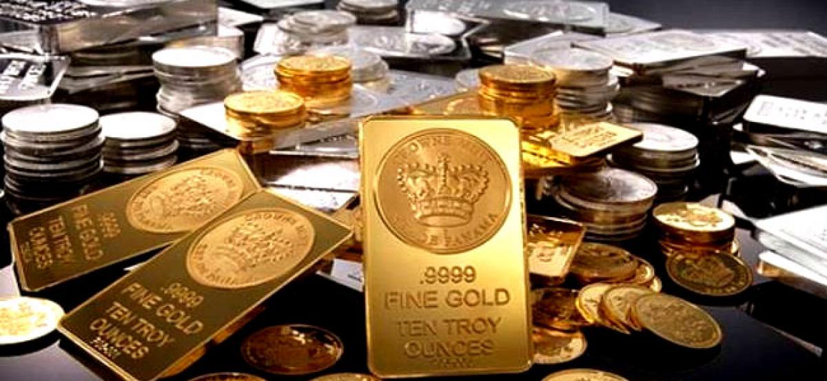 Gold gains on jewellers buying, global cues