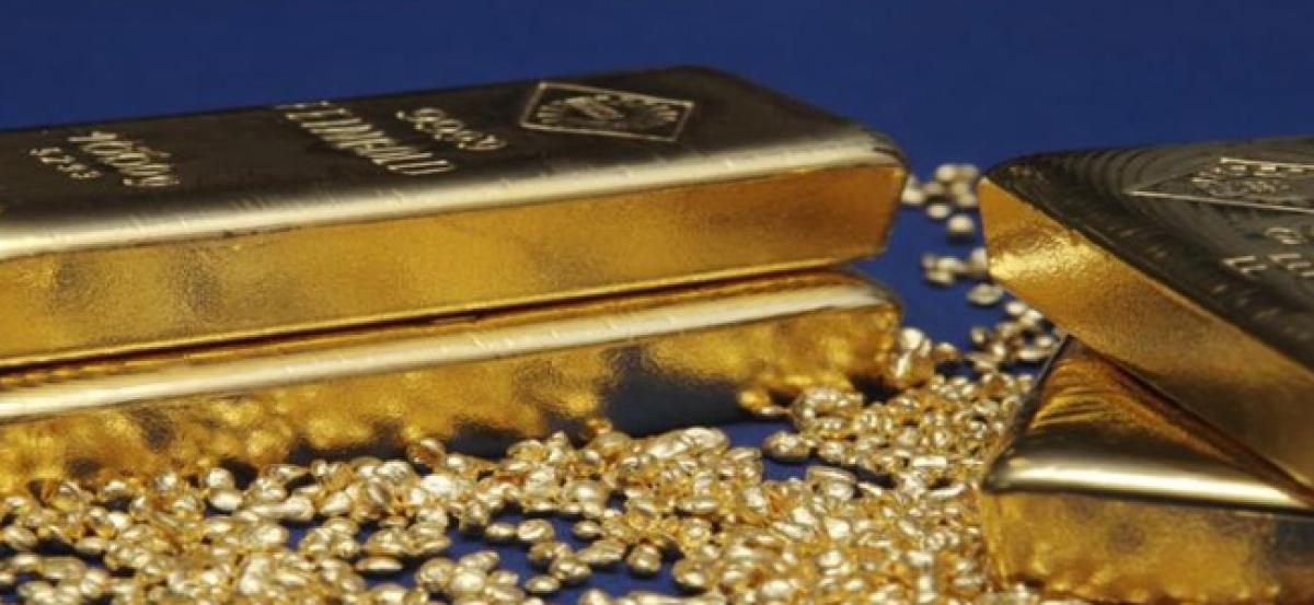 Gold eases as central bank comments lift yields