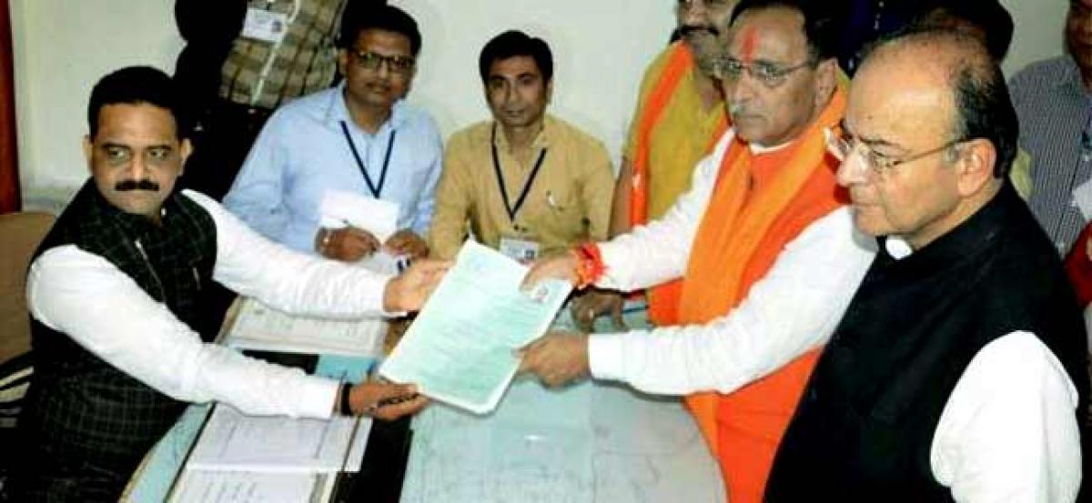 Gujarat CM Rupani files nomination, says Congress has outsourced election to three activists