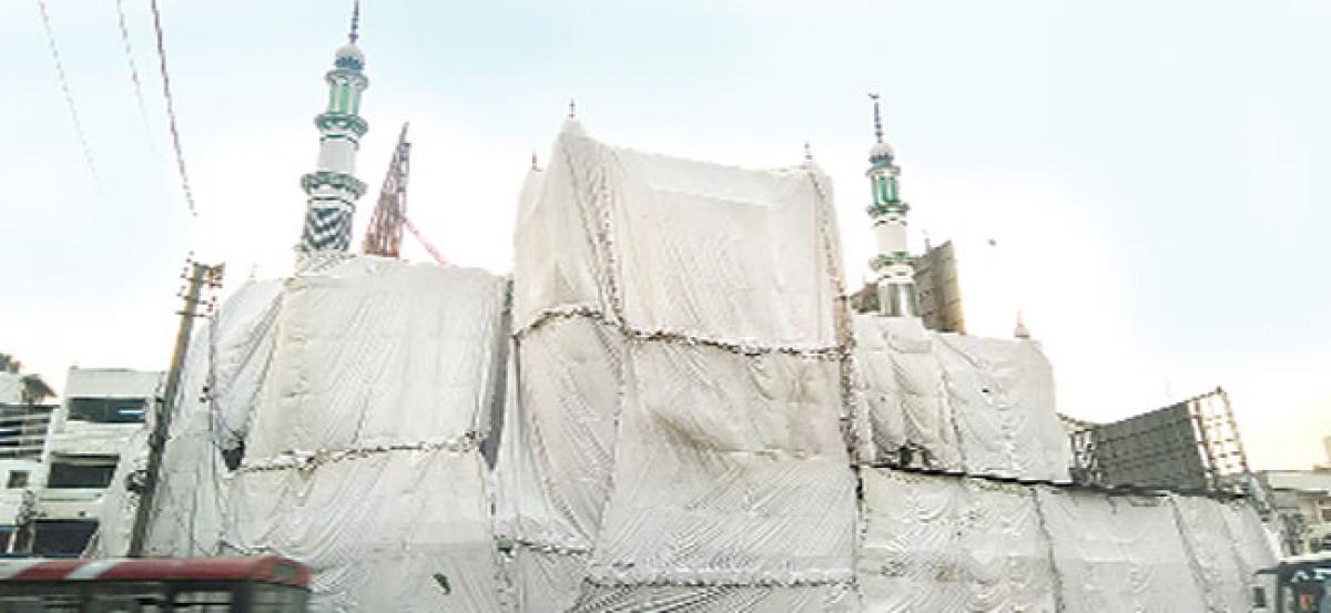 Mosques draped in cloth in Old City