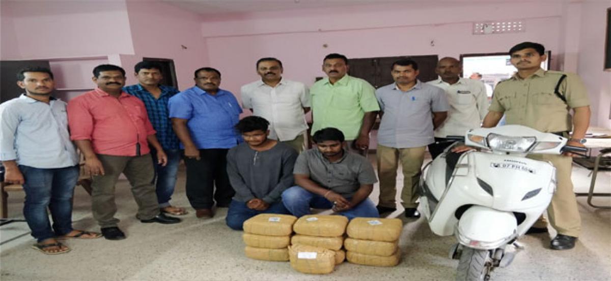 Two youth held for transporting ganja to city