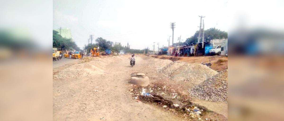 Resume road-widening works brazenly