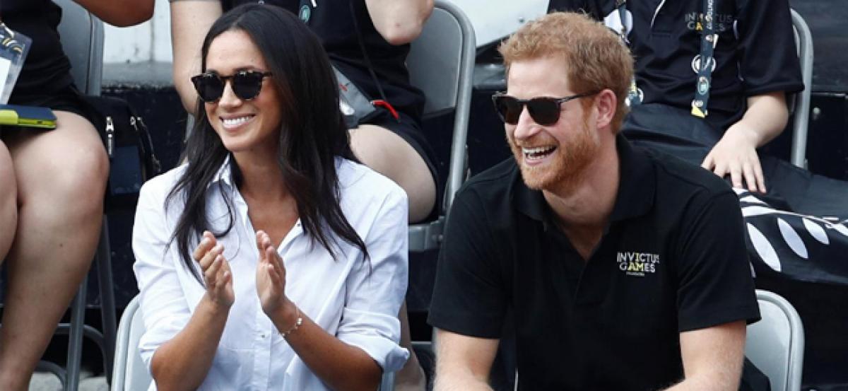 Britains Prince Harry makes first public appearance with girlfriend