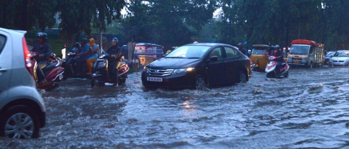 Sudden rains throw Hyderabad out of gear