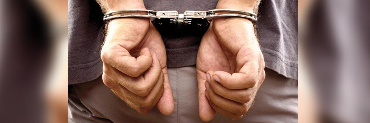 Four held for duping professor