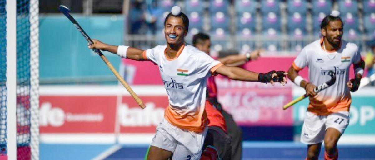 India launch title defence with 11-0 win over Oman