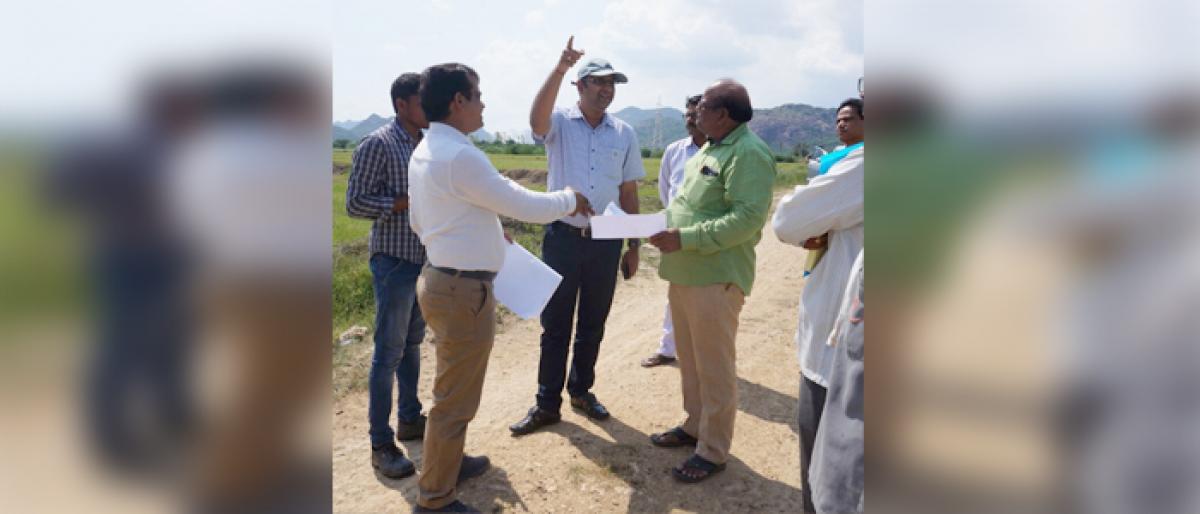 Commissioner Srikesh B Lathkar inspects land allotted for houses in Guntur