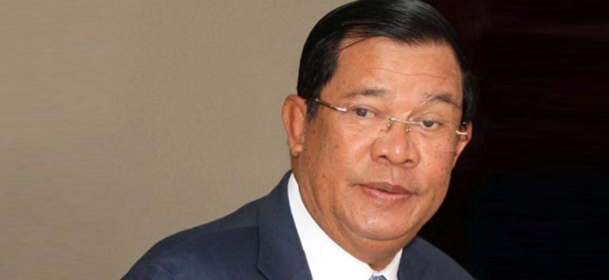 Laos says it will withdraw troops as Cambodias Hun Sen visits