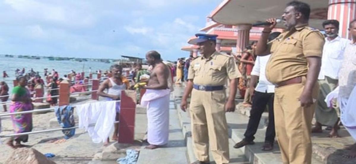 Following INCOIS advisory, devotees stopped from taking holy bath in Agni Theertham Sea