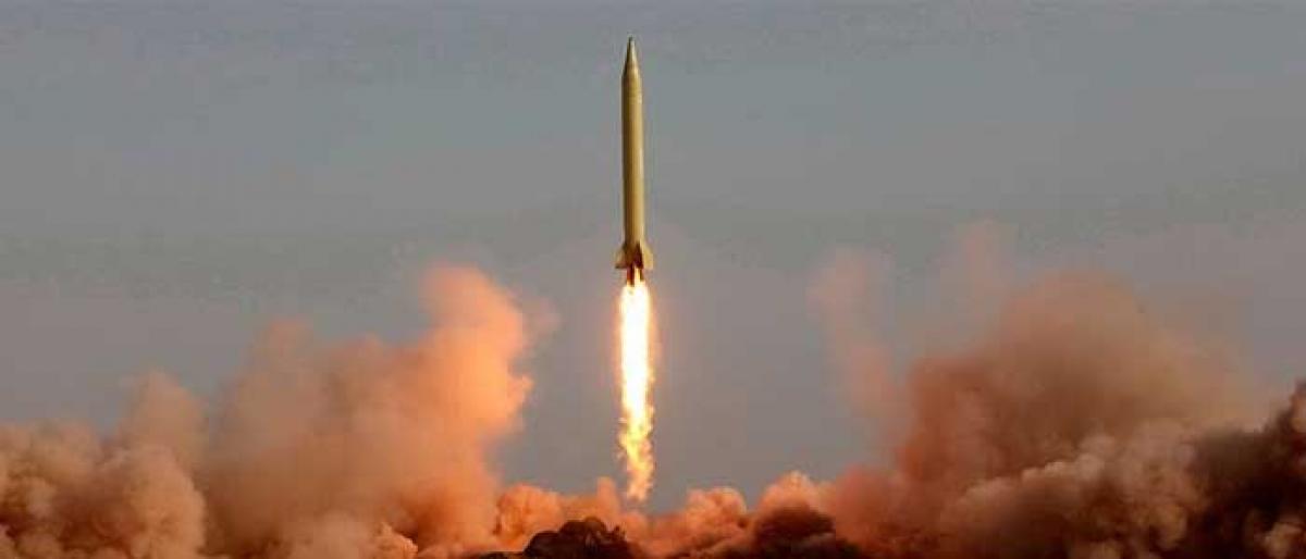 Iran defies US, tests new missile