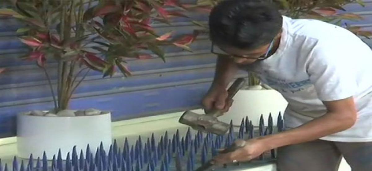 After facing flak, HDFC removes iron spikes