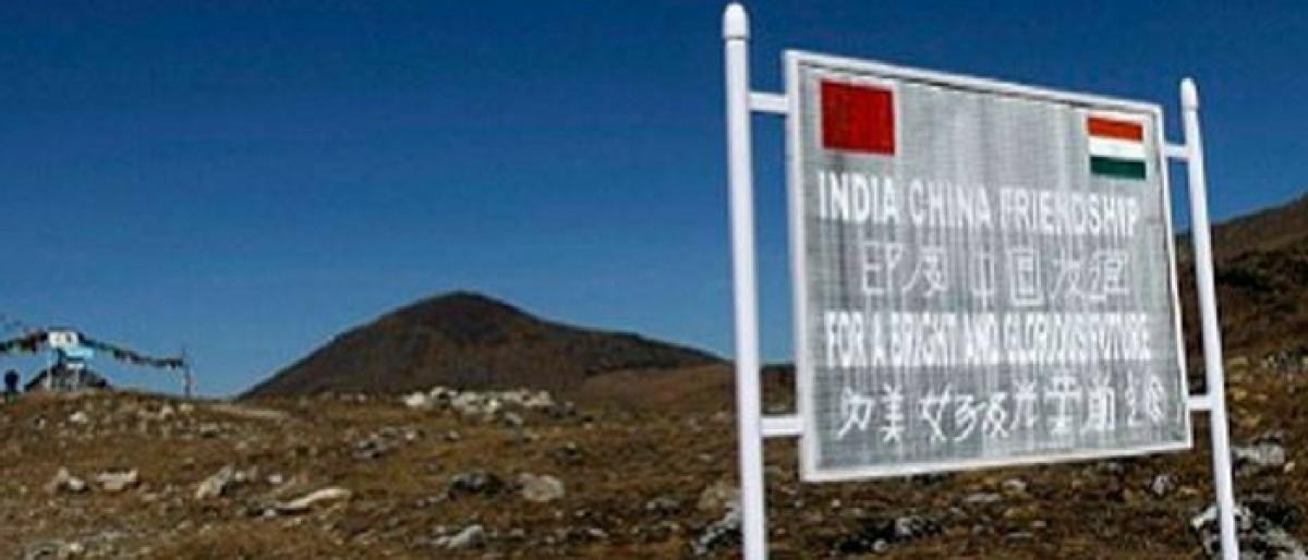 China asks India again to pull back from Doklam