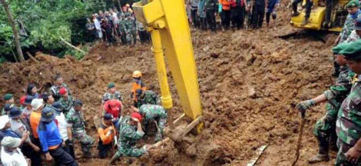 Indonesia landslide: Woman pulled out alive after being trapped for 13 hrs