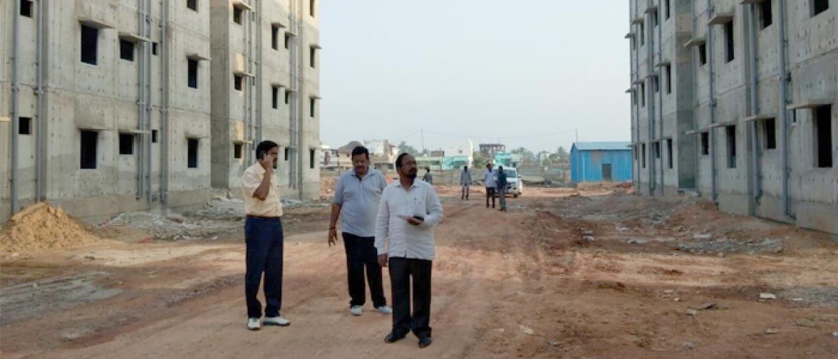 Civic chief K Ramesh inspects PMAY housing units