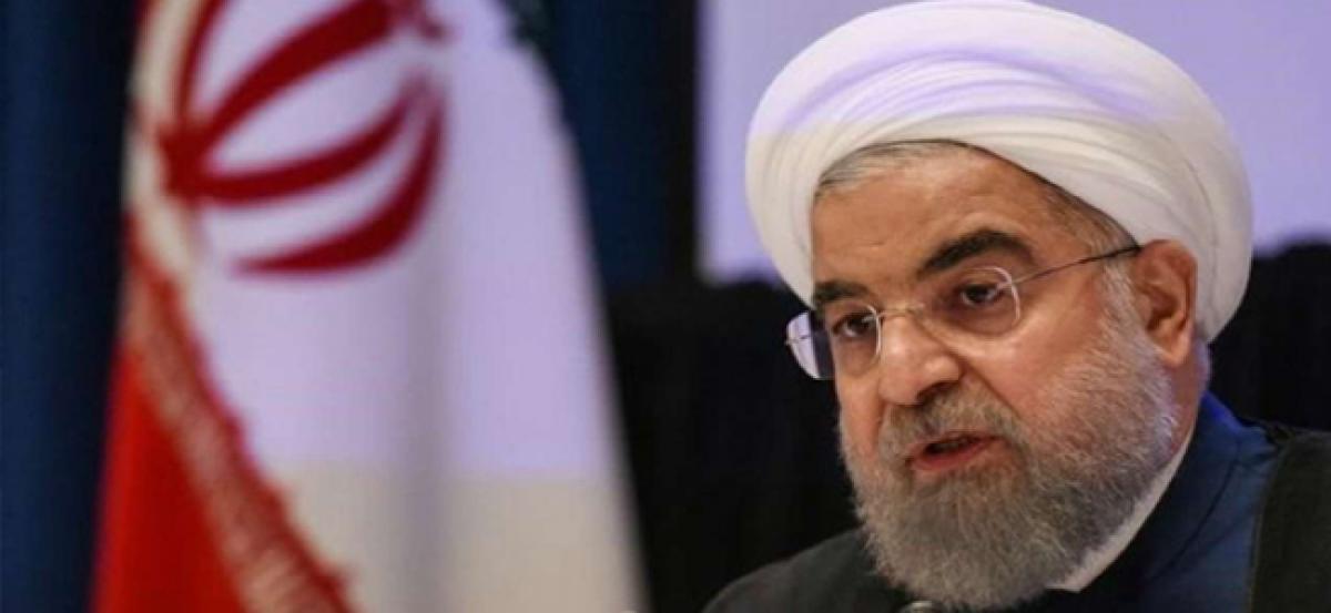 Hassan Rouhani says Tehran will remain in nuclear deal if its benefits are guaranteed