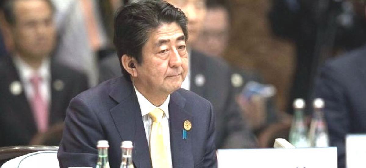 Japan PM Abe to reshuffle cabinet as support plunges to lowest since 2012