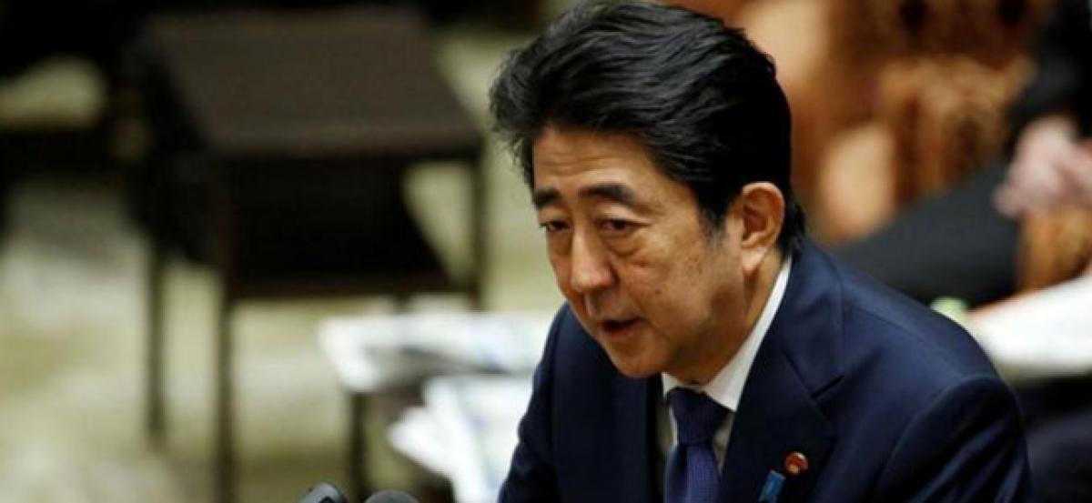 Japan PM revises when he knew about friends vet school application