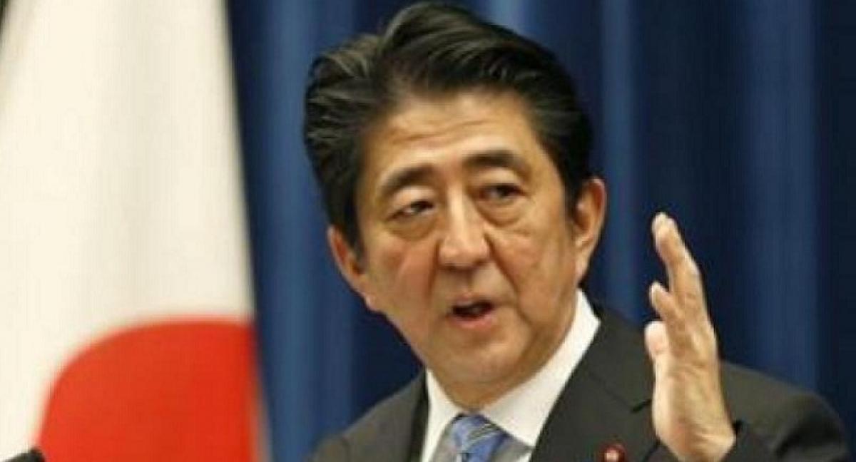 Japans Shinzo Abe re-elected as as party head, to continue as PM