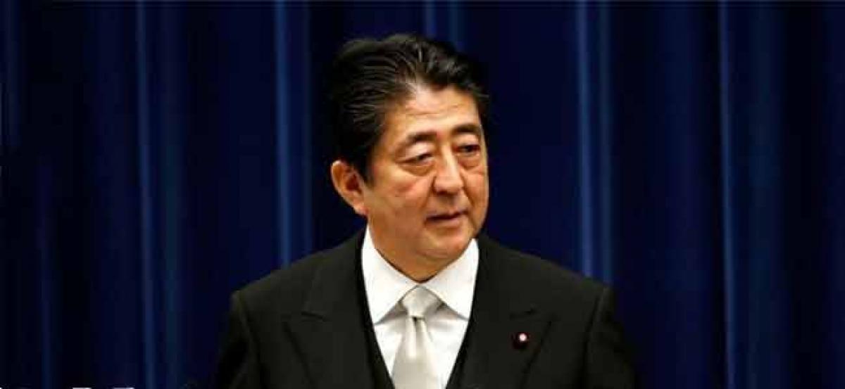 Japan PM Abes support rebounds after cabinet reshuffle