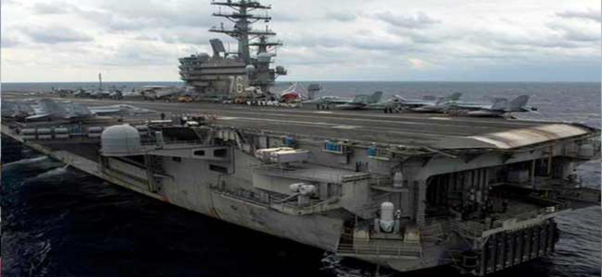US Navy aircraft with 11 onboard crashes into sea near Japan