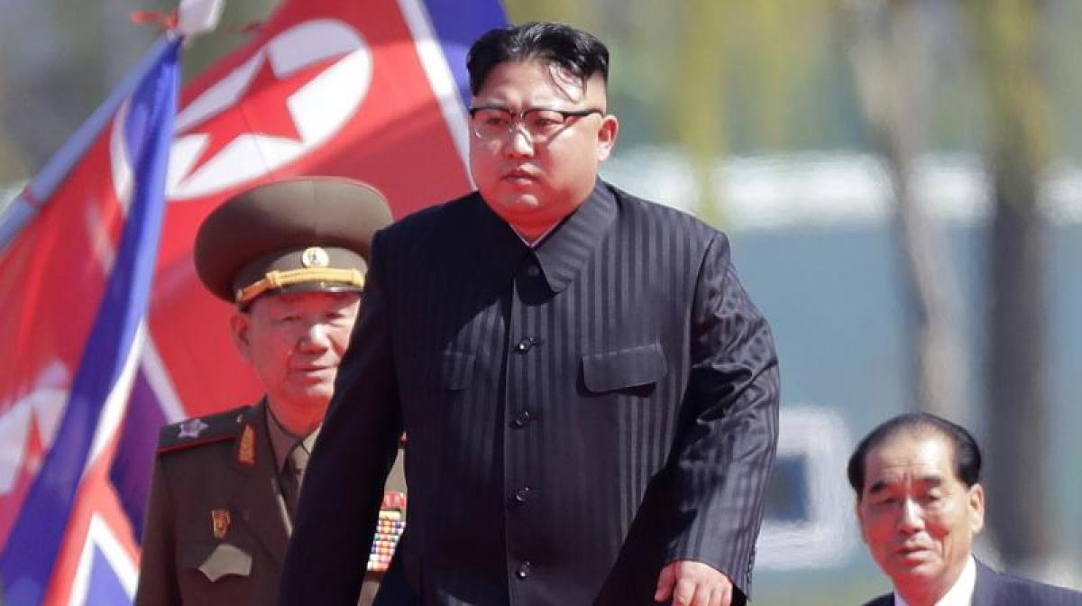 At party meeting, Kim Jong-Un praises nuclear program, promotes sister