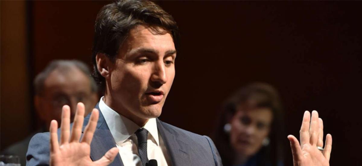 Canadian PM Justin Trudeau denies groping reporter at 2000 music fest