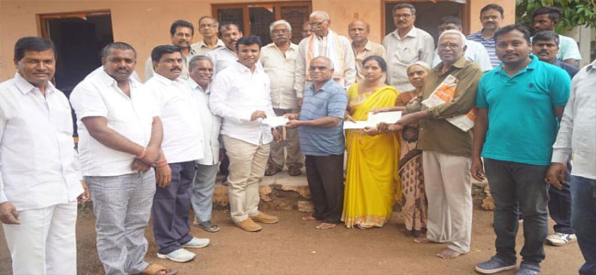 MLA K P Vivekananda distributes Kalyana Lakshmi and Shaadi Mubarak cheques worth `13 lakh