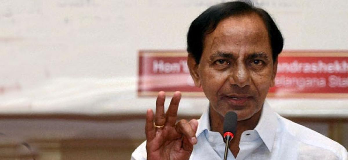 Past governments negligence benefited land mafias: KCR