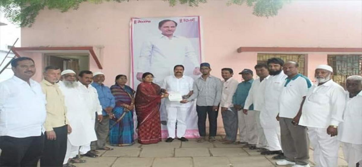 Telangana CM relief fund cheques distributed at Sainagar