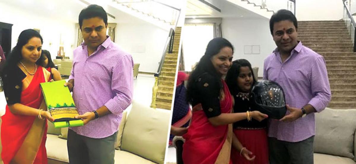 KTR gets helmet as Rakhi gift from Kavitha