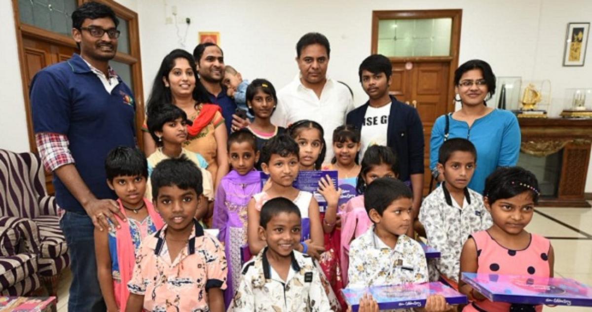 KTR hands over Rs 12 lakh cheque to Helping Hands Humanity