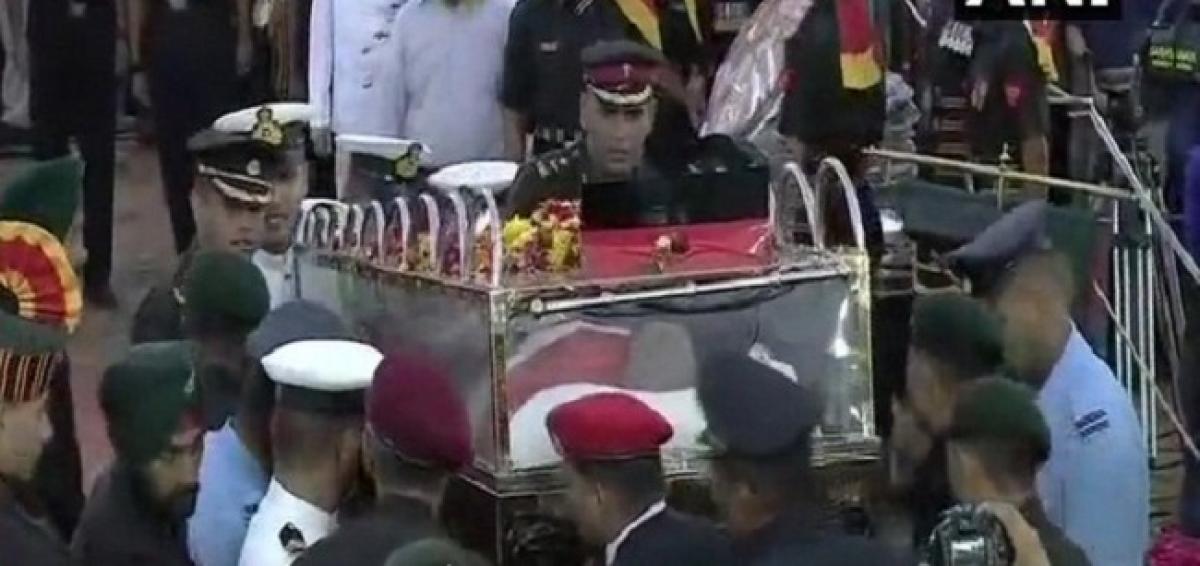 Karunanidhi laid to rest at Marina Beach