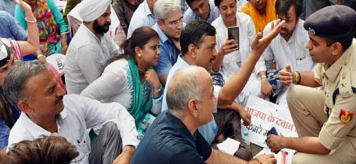 Kejriwal, ministers stage sit-in at LG office